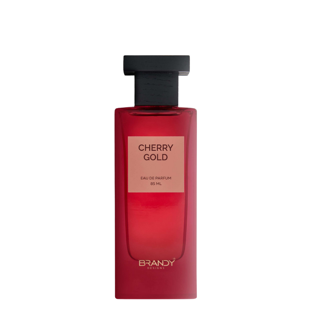 Cherry Gold Eau de Parfum 85ml by Brandy Designs – sleek red fragrance bottle with minimalist label and black cap. 