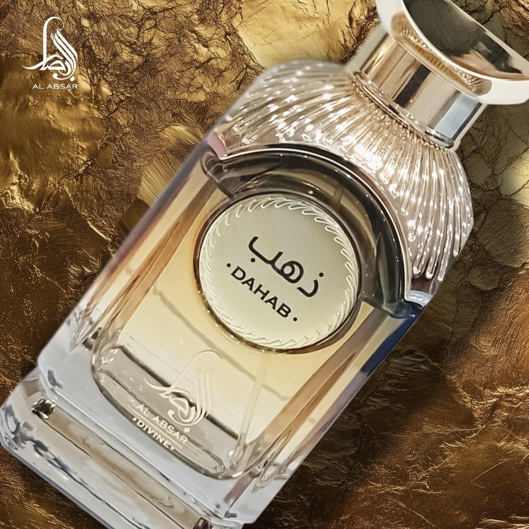 Perfume bottle labeled 'DAHAB' on a gold leaf background