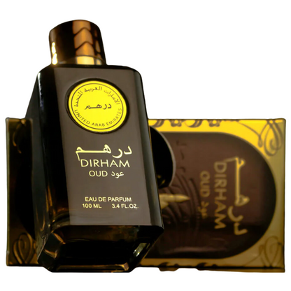 Luxury Dirham Oud perfume bottle by Ard Al Zaafaran lying on gold-accented gift box – Arabian oud fragrance