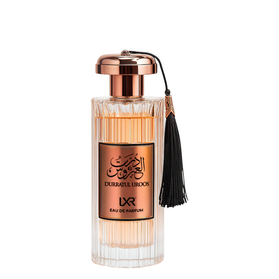 Durratul Uroos perfume bottle with a black tassel on a white background. Durratul Uroos by LXR Womens Perfume
