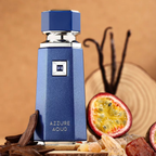 French Avenue Azzure Aoud bottle with passionfruit and wood props