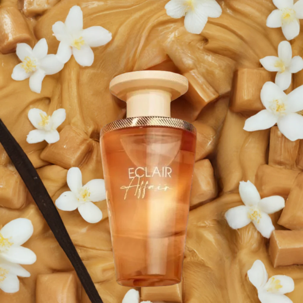 Eclair Affair perfume bottle on a caramel background with flowers