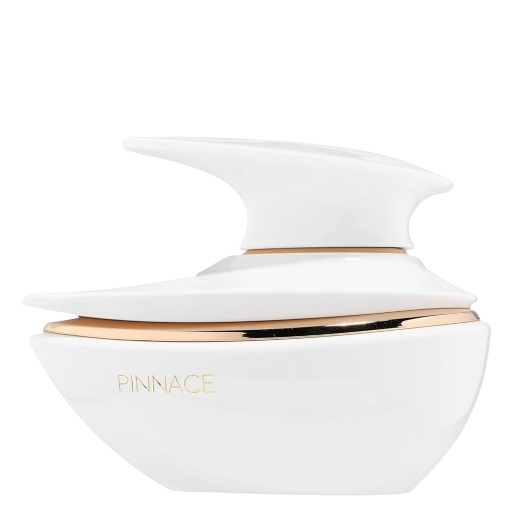 A white bottle of Pinnace Blanc Perfume with a gold and white label, and the name 'Pinnacle' printed on the side.