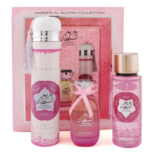Hareem Al Sultan perfume set with pink and white bottles against a pink background