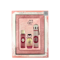 A 3-piece gift set by Ard Al Zaafaran, Hareem Al Sultan collection, containing a perfume mist, perfume EDP, and an air freshener, all presented in a pink and gold box.