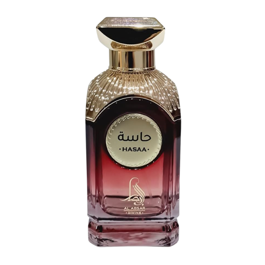 Perfume bottle with gold cap and red base on a white background