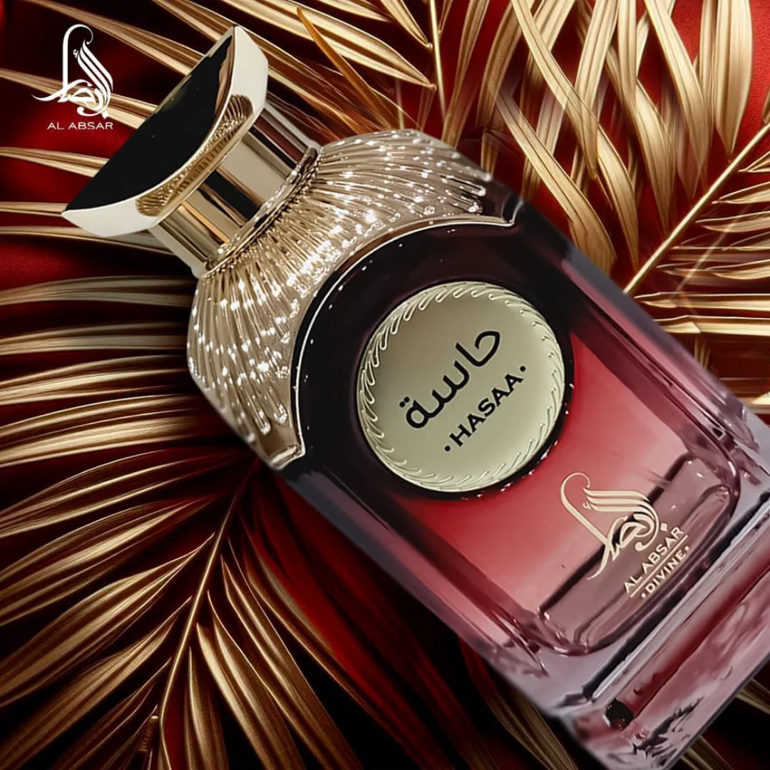 Perfume bottle with gold cap and 'Al Arsar' branding on a red and gold leafy background