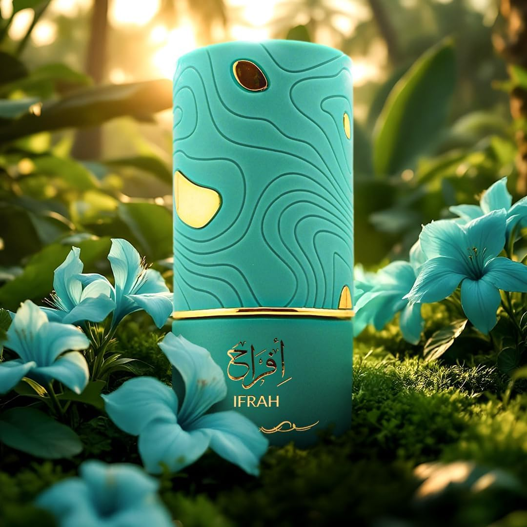 Teal perfume bottle with gold accents on a grassy background with flowers