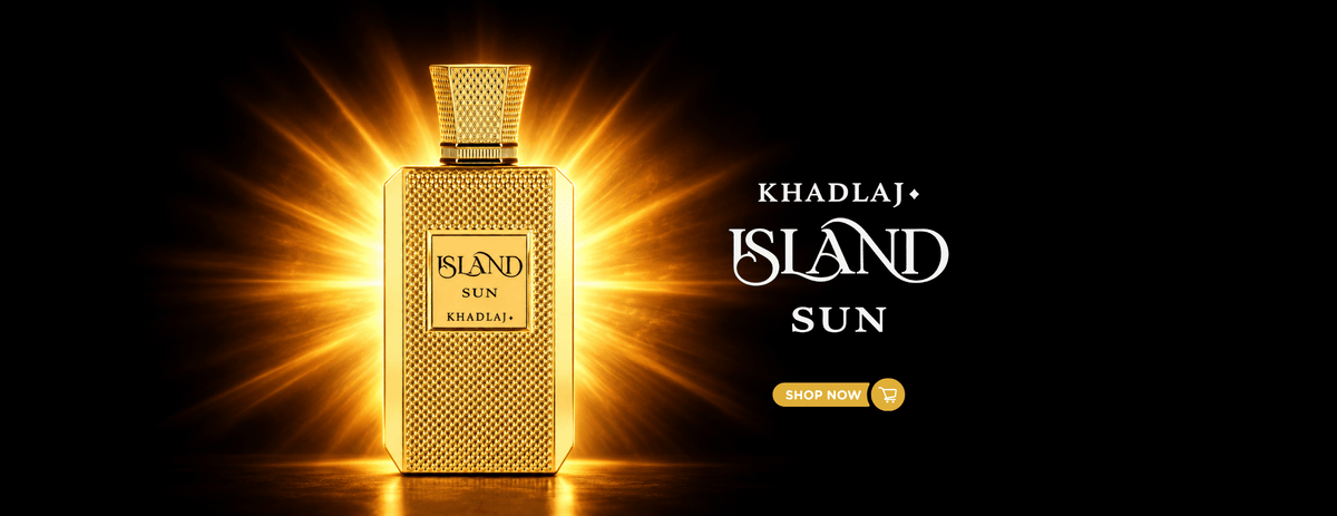 A bottle of Khadlaj Island Sun perfume is centered against a black background with dramatic golden light rays bursting from behind it. The bottle is textured and metallic gold, with the brand name 'KHADLAJ' and product name 'ISLAND SUN' displayed on the right side.