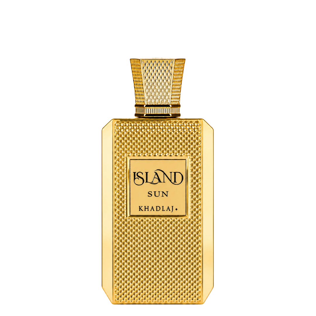A rectangular gold perfume bottle with a textured, woven-like metallic surface and a matching cap, featuring a central label that reads 'ISLAND SUN KHADLAJ'.