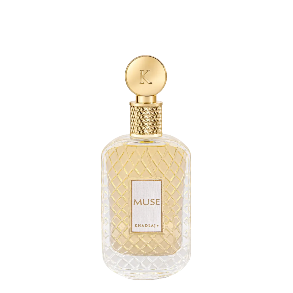 A bottle of Khadlaj Muse perfume, featuring a clear textured glass bottle with a gold cap and a gold label, set against a plain white background.