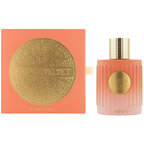 Khadlaj Peach Velvet perfume bottle and its matching peach-colored box, both featuring a textured gold circular emblem with the brand name.