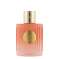A bottle of Khadlaj Peach Velvet perfume with a ribbed peach-pink bottle, a gold circular label, and a textured gold cap, set against a plain white background.