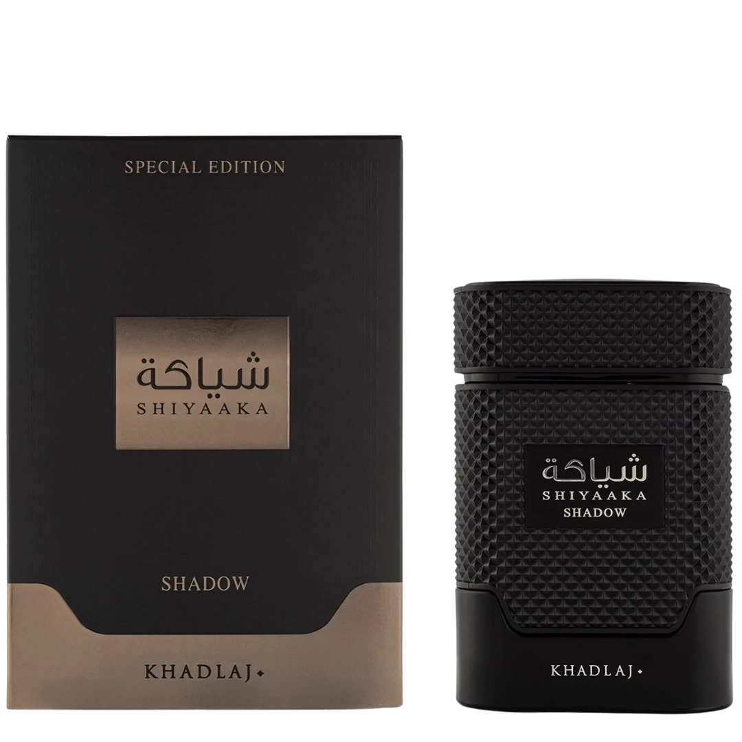 Shiyaaka Shadow perfume by Khadlaj, shown with its black packaging box and the textured black cylindrical bottle on a plain white background.