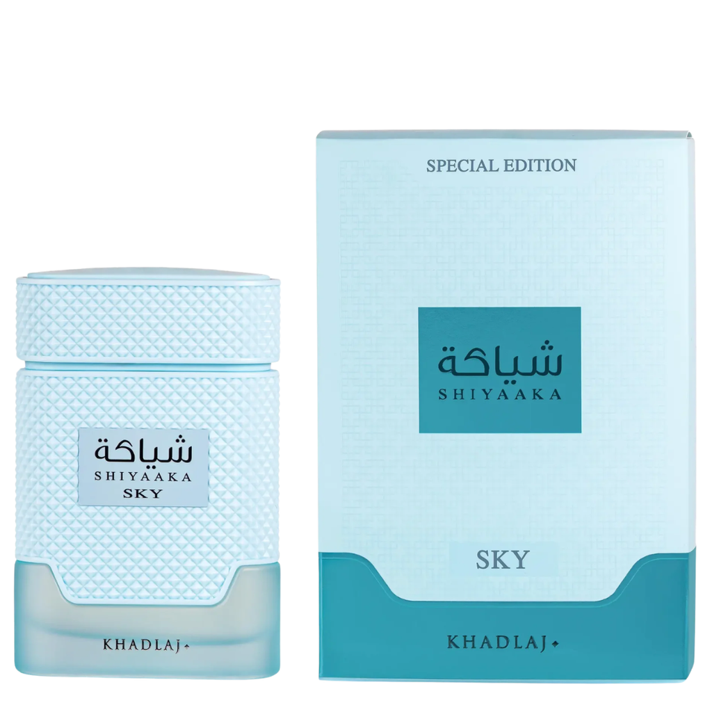 Khadlaj Shiyaaka Sky Special Edition perfume bottle and its packaging box, both in light blue and teal colors, on a white background.