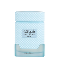 Shiyaaka Sky by Khadlaj perfume bottle in a light blue textured glass design with a clear lower section, shown on a solid white background.