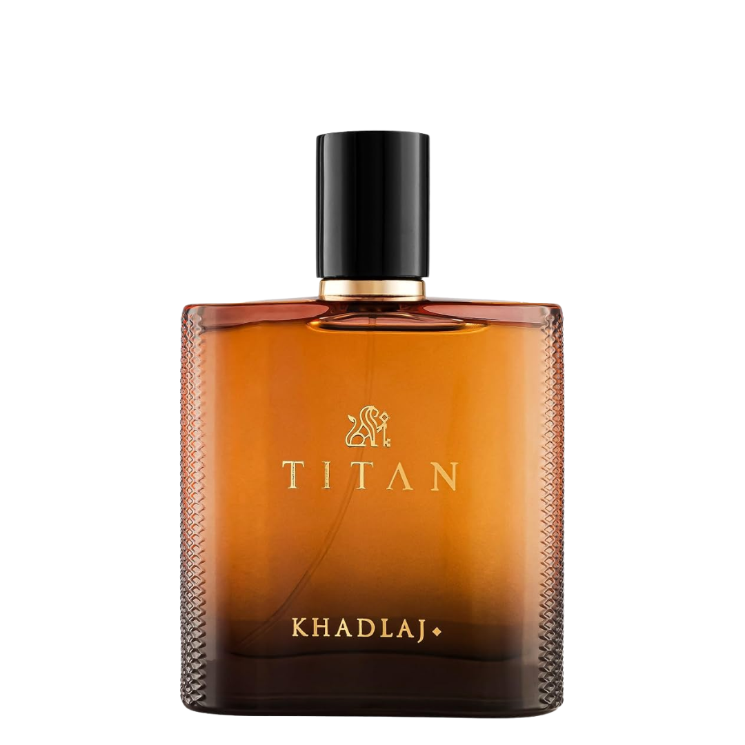 Khadlaj Titan cologne bottle in amber brown glass with a black cap and gold lettering, shown on a plain white background.