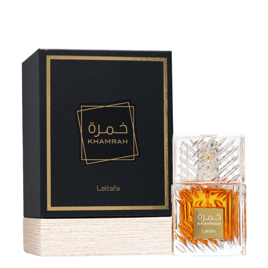 Clone / dupe of / inspired by Killian - Angels' Share unisex scents. Lattafa Khamrah Eau de Parfum with Luxury Perfume Box β Elegant amber fragrance in a premium clear glass bottle with intricate cuts, paired with a black and gold presentation box, perfect for niche perfume lovers.