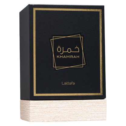 Clone / dupe of / inspired by Killian - Angels' Share unisex perfume. Lattafa Khamrah Premium Perfume Packaging – Stylish black and gold perfume box with textured wooden base, highlighting a high-end Middle Eastern fragrance presentation.
