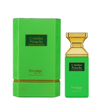 Green perfume bottle and packaging with gold accents on a white background