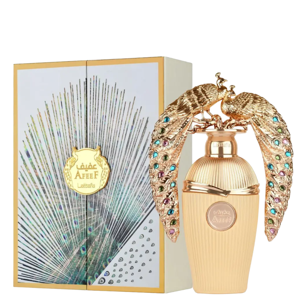 A perfume bottle and its decorative box. The bottle is a ribbed pale gold color with a large ornate gold peacock design draped over the cap, adorned with colorful rhinestones. Lattafa: Afeef