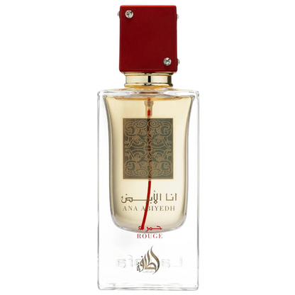 Ana Abiyedh Rouge perfume by Lattafa – elegant Arabian fragrance in a clear glass bottle with gold label, deep red cap, and amber-colored perfume. A bottle of Ana Abiyedh Rouge perfume by Lattafa with a clear glass body and a red cap, displaying the label and the fragrance name. Clone / dupe of / inspired by Maison Francis Kurkdjian - Baccarat Rouge 540 perfume.