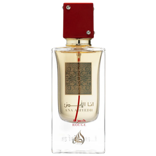 Ana Abiyedh Rouge perfume by Lattafa – elegant Arabian fragrance in a clear glass bottle with gold label, deep red cap, and amber-colored perfume. A bottle of Ana Abiyedh Rouge perfume by Lattafa with a clear glass body and a red cap, displaying the label and the fragrance name. Clone / dupe of / inspired by Maison Francis Kurkdjian - Baccarat Rouge 540 perfume.