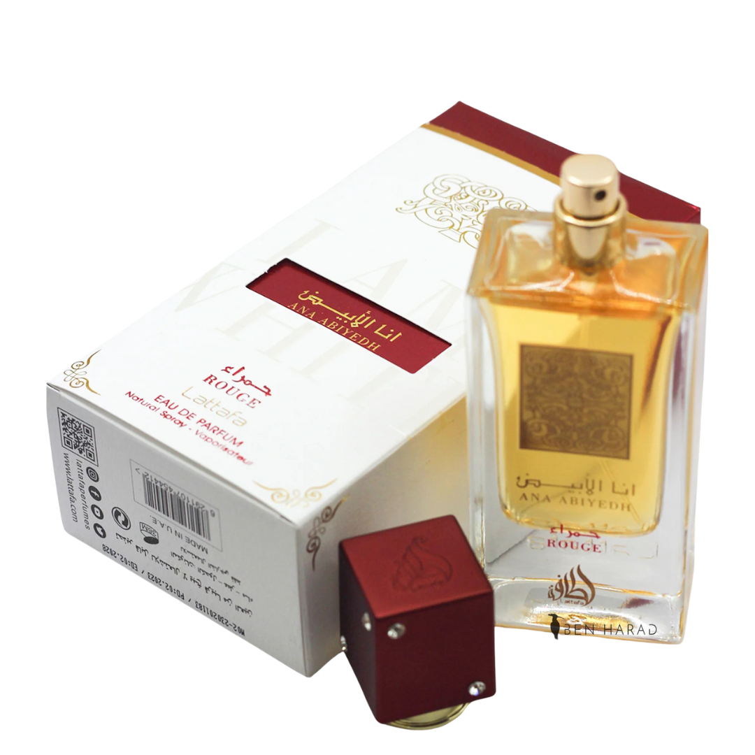 Ana Abiyedh Rouge perfume by Lattafa – luxurious Arabian fragrance showcased with its elegant box, featuring a golden label and rich amber liquid. Clone / dupe of / inspired by Maison Francis Kurkdjian - Baccarat Rouge 540 perfume.