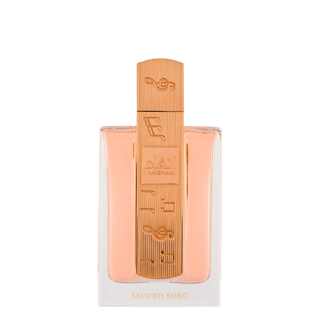 A bottle of Angham Second Song perfume with a peach-colored liquid inside a clear glass bottle, featuring a prominent vertical gold-toned wooden-textured cap with musical notes and the brand name 'EHAB' and 'SECOND SONG' printed on it, set against a plain white background.
