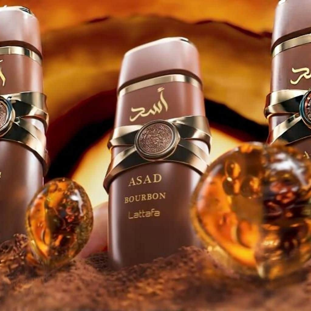 Lattafa Asad Bourbon perfume artistic display with amber resin and rich oriental spicy aroma. 