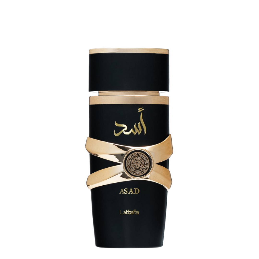 A black bottle of Asad Perfume by Lattafa with gold accents and Arabic script on the label. Black and gold bottle of Asad by Lattafa Eau de Parfum – Luxury men’s fragrance in a matte black cylindrical bottle with golden Arabic script and gold crisscross band, 100ml. 