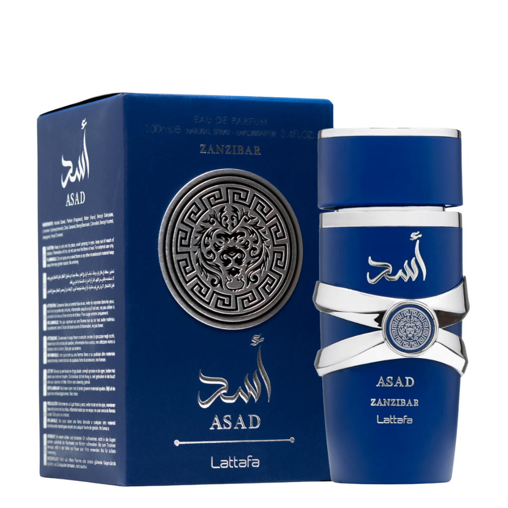 Lattafa Asad Zanzibar perfume bottle and packaging in bold blue with silver lion emblem design. 