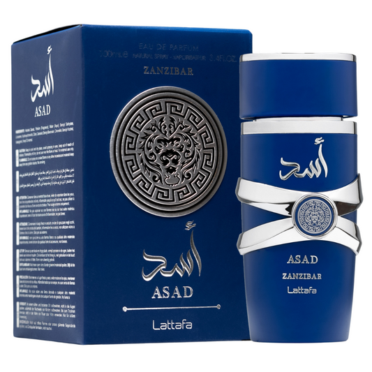 Lattafa Asad Zanzibar perfume bottle and packaging in bold blue with silver lion emblem design. Clone / dupe of / inspired by Jean Paul Gaultier - Le Beau perfume.