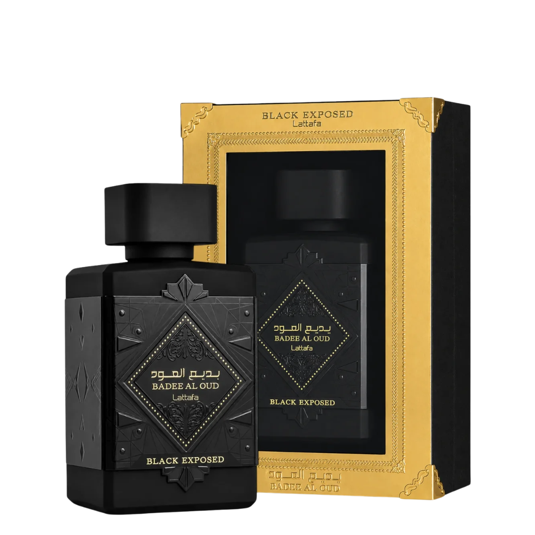 Black Exposed Badee Al Oud perfume bottle in front of its matching black and gold packaging box, on a clean white background.