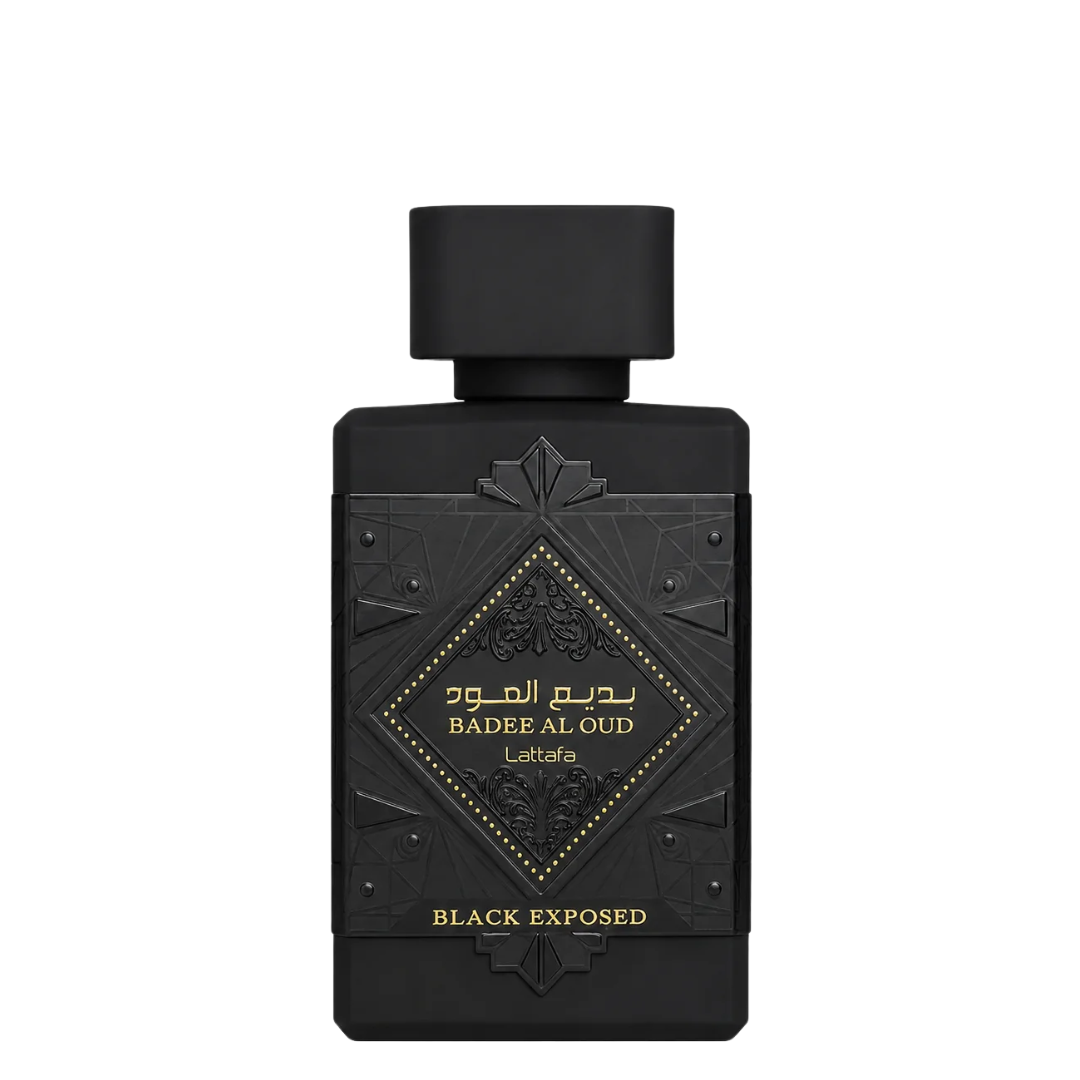A rectangular black perfume bottle with a matching black cap, featuring gold Arabic and English lettering that reads 'BADEE AL OUD' and 'BLACK EXPOSED' on a clean white background.