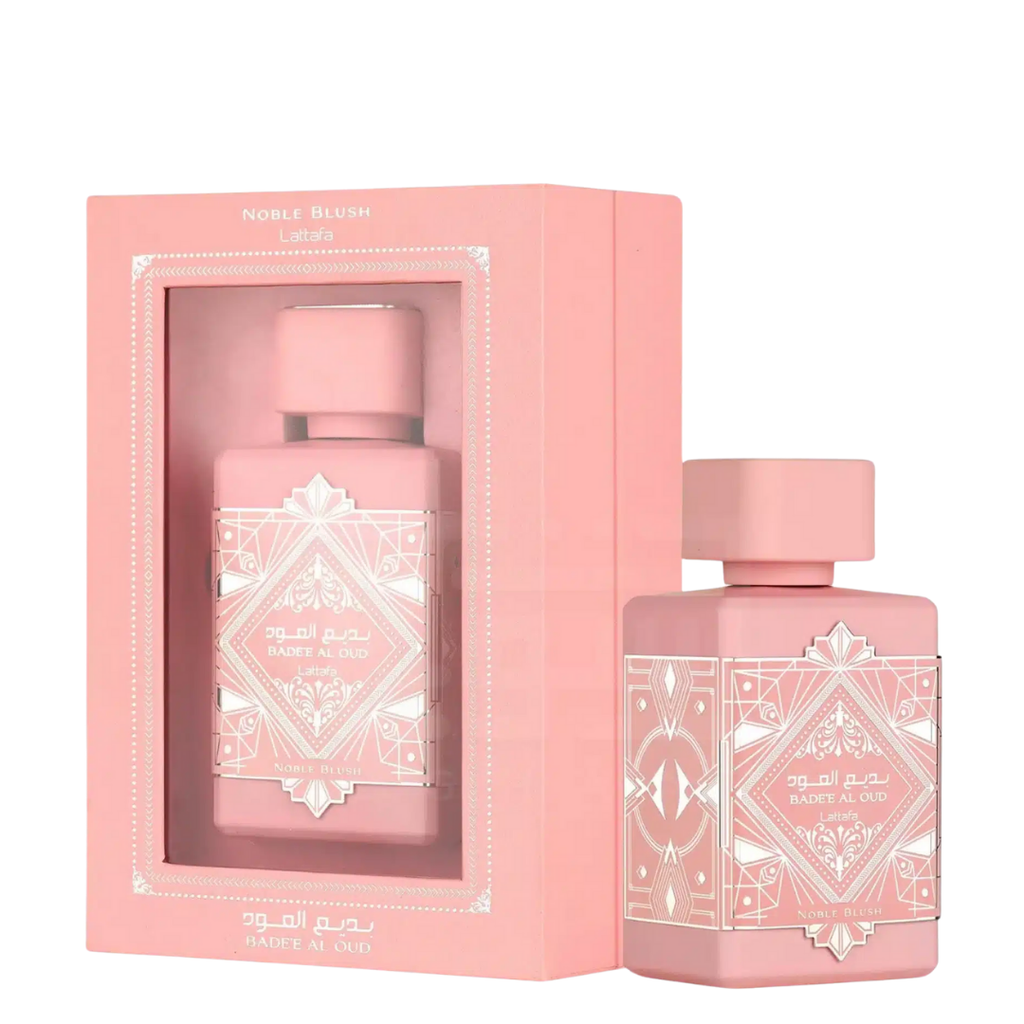 Pink perfume bottle with decorative packaging on a white background. Lattafa Badee Al Oud Noble Blush Unisex Perfume