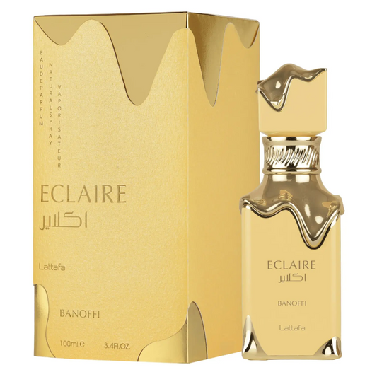 Gold Eclaire perfume bottle and packaging on a white background. Lattafa Eclaire Banoffi Unisex Perfume