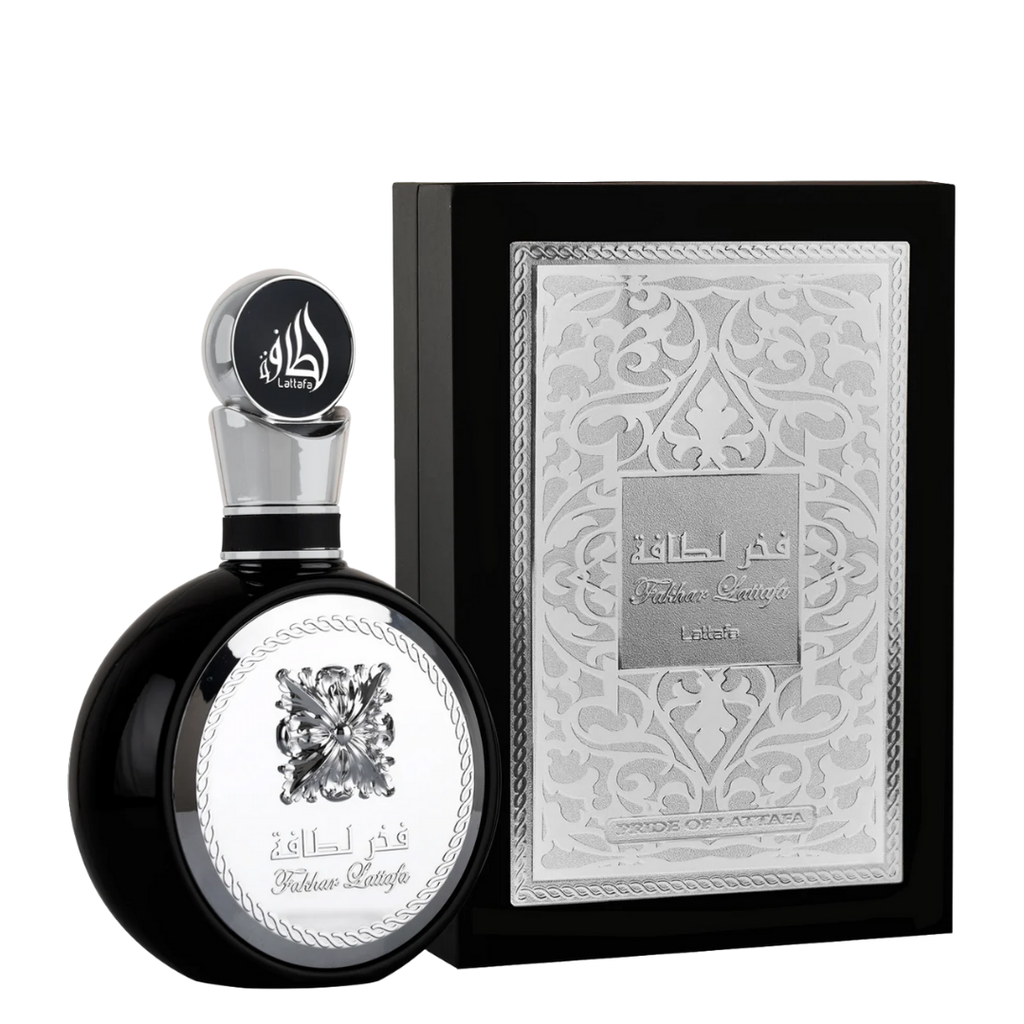 Lattafa Fakhar Black Perfume with Premium Packaging – Eau de Parfum for Men
Lattafa Fakhar Black fragrance bottle with intricate silver design alongside its luxury black and silver box, perfect for gifting.