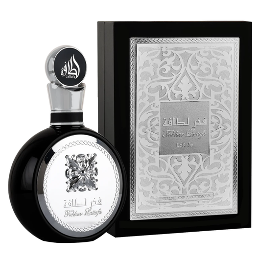 Lattafa Fakhar Black Perfume with Premium Packaging – Eau de Parfum for Men
Lattafa Fakhar Black fragrance bottle with intricate silver design alongside its luxury black and silver box, perfect for gifting. Clone / dupe of / inspired by Yves Saint Laurent - Y perfume.