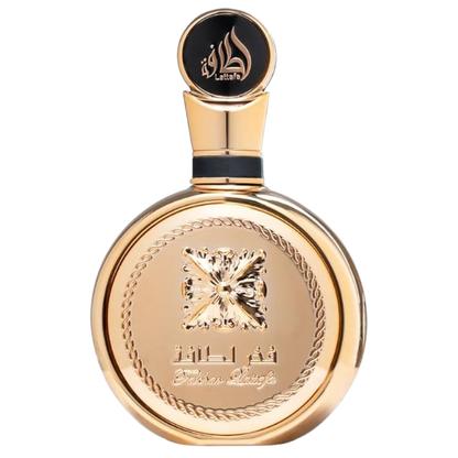 Fakhar Extrait by Lattafa Perfumes – luxurious gold fragrance bottle with intricate embossed design, premium Arabic perfume for men and women. Clone / dupe of / inspired by Paco Rabanne - 1 Million Parfum perfume.