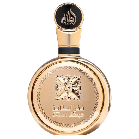 Fakhar Extrait by Lattafa Perfumes – luxurious gold fragrance bottle with intricate embossed design, premium Arabic perfume for men and women. Clone / dupe of / inspired by Paco Rabanne - 1 Million Parfum perfume.