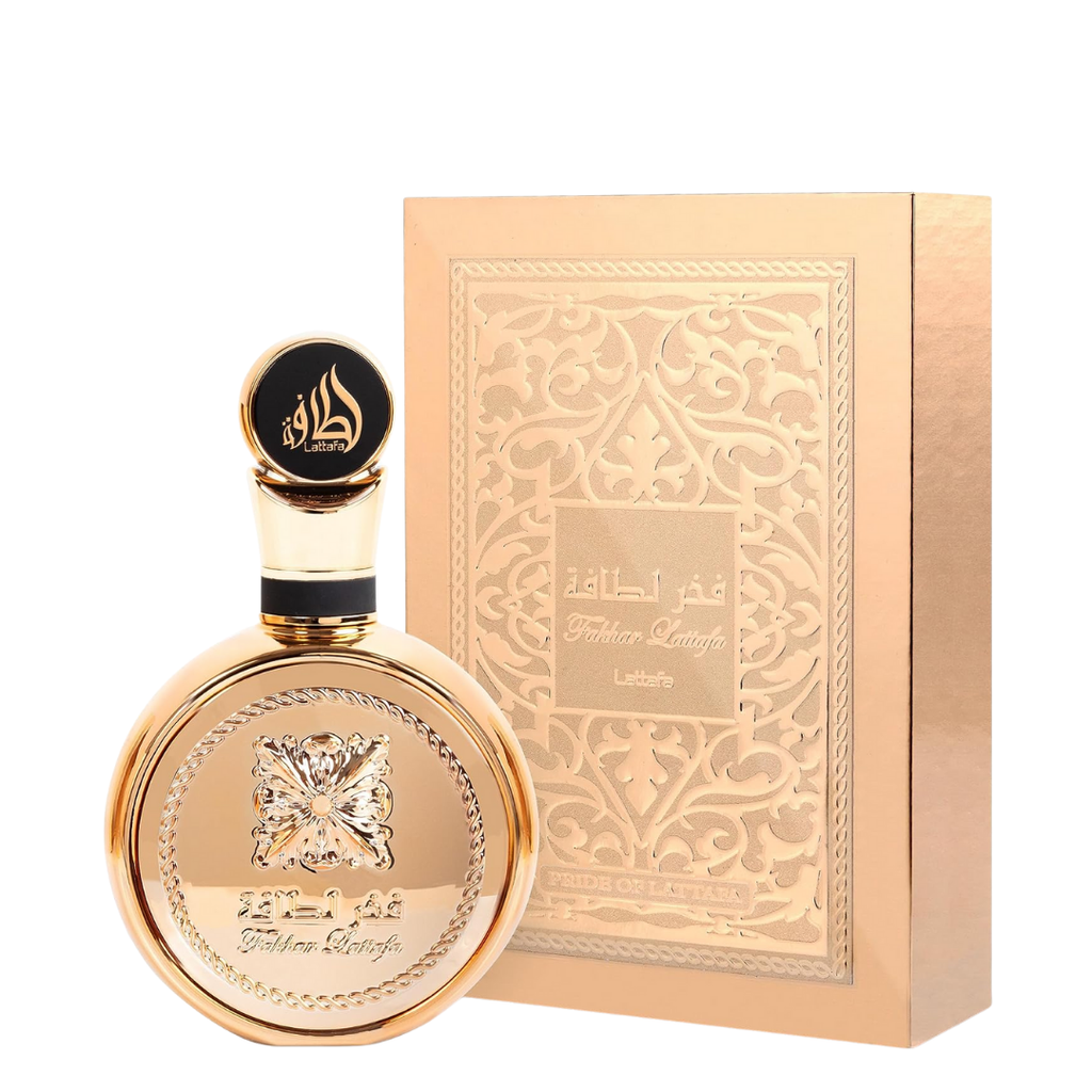 Lattafa Fakhar Extrait perfume – elegant gold bottle and matching ornate gift box, opulent unisex fragrance with long-lasting scent. 
