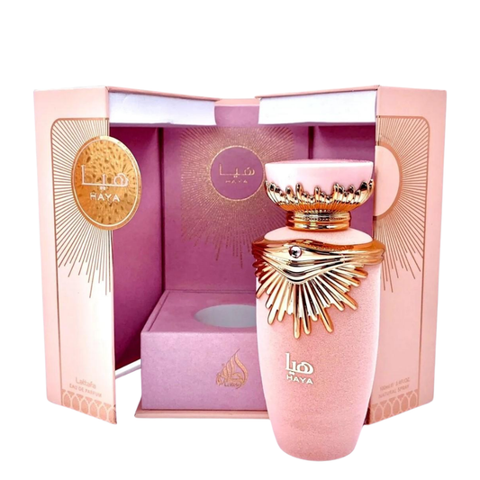 Pink perfume bottle with gold detailing in a decorative box. Lattafa Haya Womens Perfume