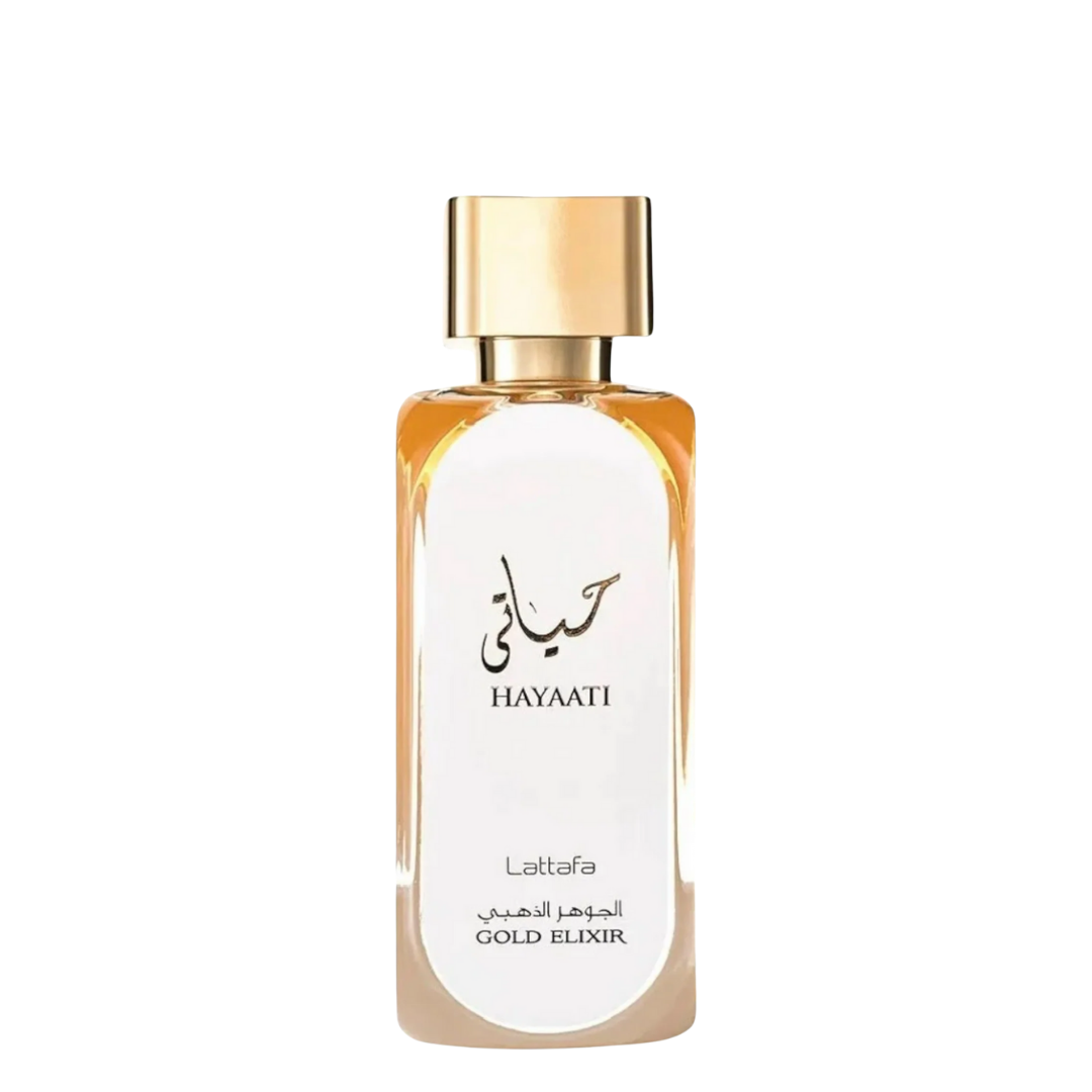 A bottle of Hayaati Gold Elixir Perfume by Lattafa with a white label, gold-colored cap, and transparent glass container showing the amber-colored perfume.