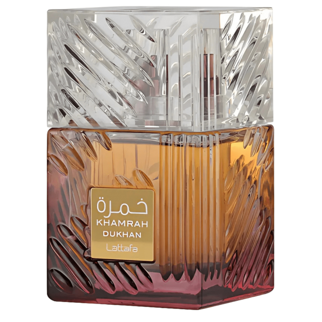 Lattafa Khamrah Dukhan Eau de Parfum – Luxury amber and gradient glass perfume bottle with crystal-cut cap, premium oriental spicy fragrance for men and women.