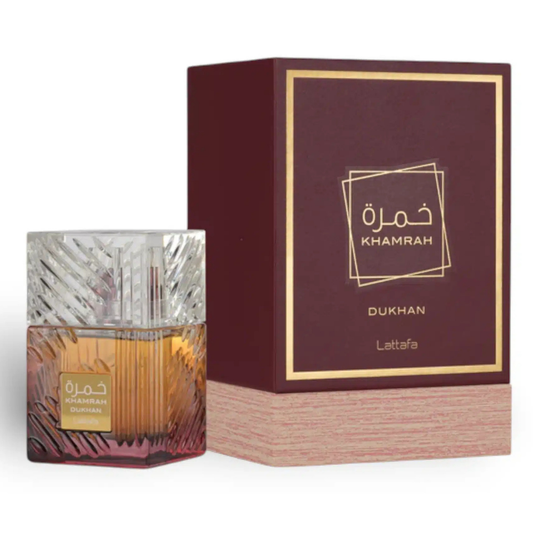 Lattafa Khamrah Dukhan perfume bottle with matching burgundy and gold packaging – opulent unisex fragrance featuring smoky, spicy, and sweet gourmand notes.