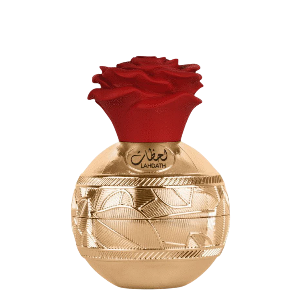 Lattafa perfume bottle with a textured gold body and a red rose cap, shown on a plain white background.