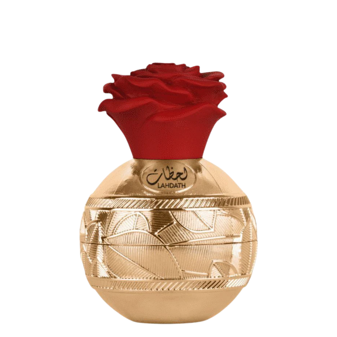 Lattafa perfume bottle with a textured gold body and a red rose cap, shown on a plain white background.