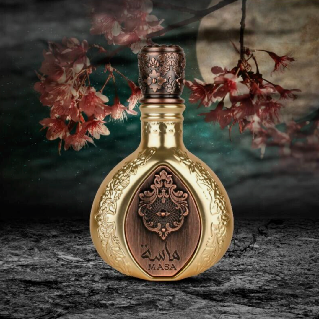Decorative gold bottle with intricate designs and cherry blossoms in the background. Lattafa Masa Unisex Perfume