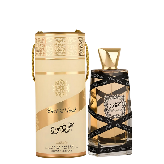 Oud Mood perfume by Lattafa with golden cylindrical packaging β oriental fragrance for men and women Clone / dupe of / inspired by Lancome - Oud Bouquet perfume.
